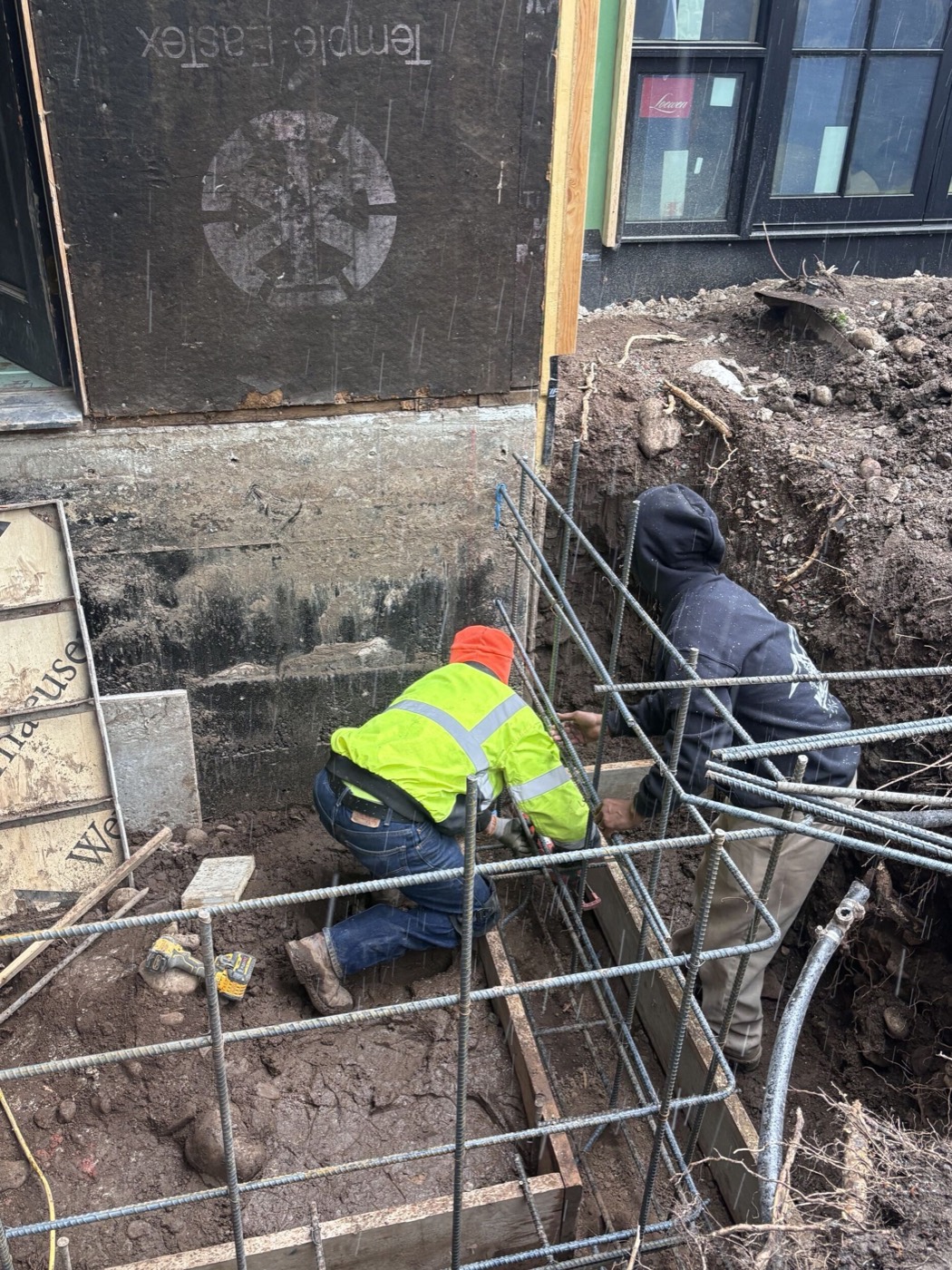 Crew setting foundation rebar
